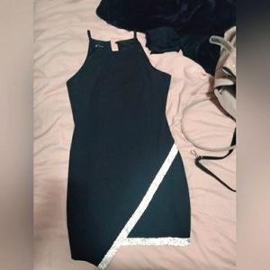 Black cocktail dress with rhinestone detail